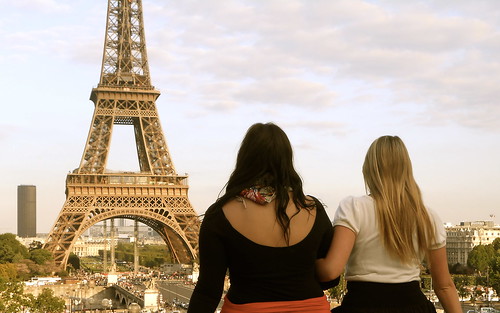 Take It All In: Two students stand before the Eiffel Tower in Paris, France.