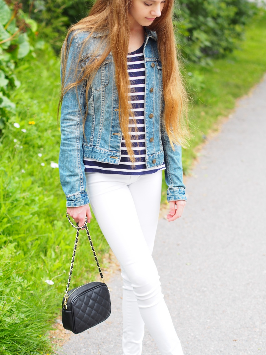 Outfit with white denim, sailor striped shirt, denim jacket and black leather accessories