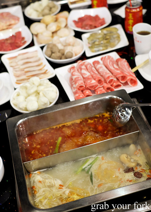 Steamboat soup with fish balls, meat and seafood at Shancheng Hotpot King, Sydney