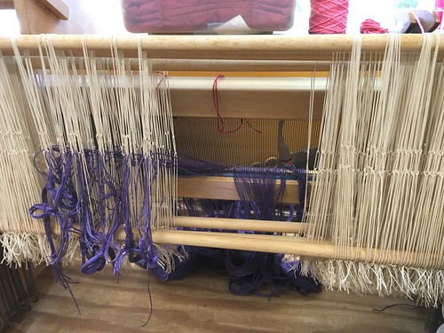 Weaving class - threading the heddles.