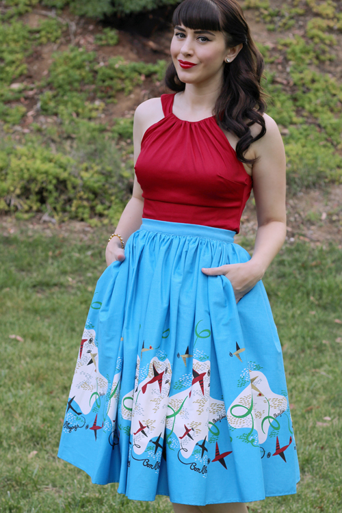 Pinup Girl Clothing Pinup Couture Jenny Skirt in Mary Blair Planes Border Print Harley Top in Red