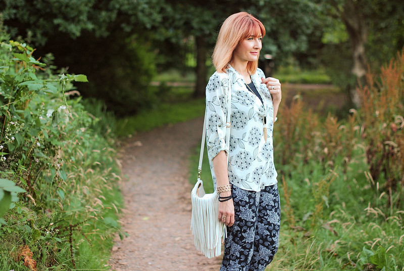 Black and white pattern mixing for summer: Dandelion flower print and paisley, red strappy sandals, fringed bag | Not Dressed As Lamb