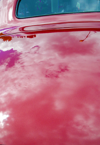 car with cloud reflections