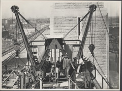 Workers on Harbour Bridge creeper crane, 1932