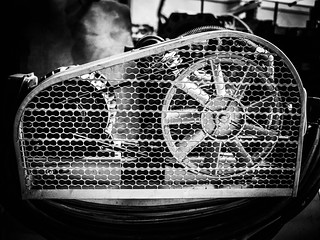 Caged | Caged belt and pulley of an air compressor. | Daniel Go | Flickr