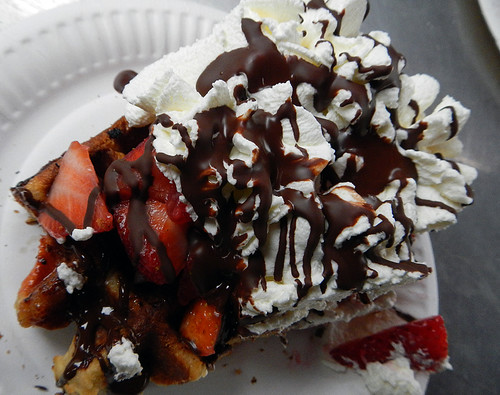 Belgian waffles with chocolate, whipped cream & strawberries