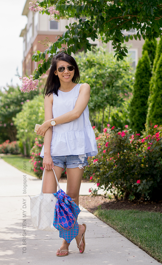 baby blue peplum top, oversized watch, distressed shorts, flip flops, blue chain scarf on white tote bag