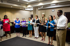 Volunteers and circuit staff taking the oath administered by Circuit Judge Karen Gievers during the guardian ad litem swearing in ceremony at the Leon County Courthouse in Tallahassee, Florida on September 28, 2012.