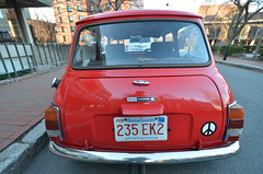 Old red Mini Cooper on Appian Way in Harvard Square