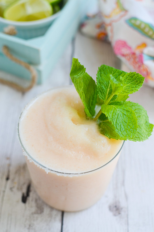 Cantaloupe Coconut Margarita - your new favorite frozen summer cocktail! Fresh cantaloupe, coconut milk, lime juice, and tequila! 