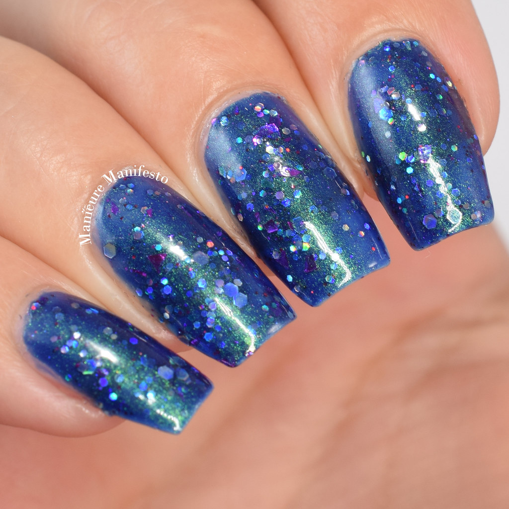 Blue nail polish with glitter