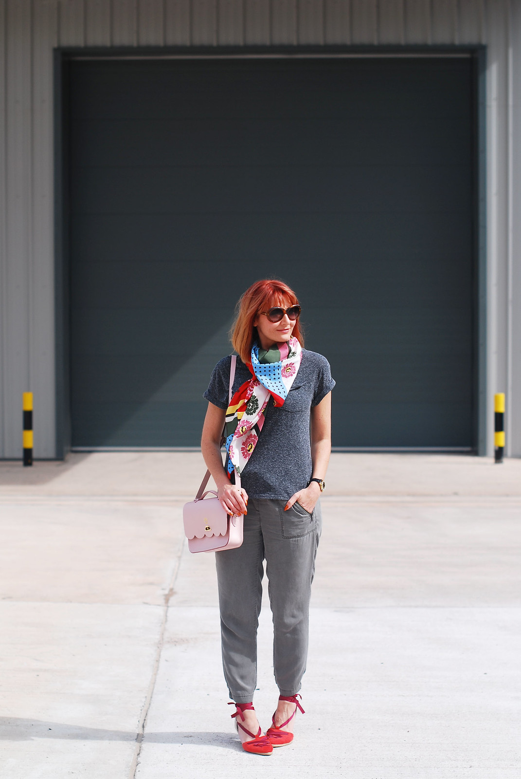 Simple grey and khaki outfit accessorised with brights: Multicoloured scarf, pink satchel bag, red lace-up espadrilles | Not Dressed As Lamb, over 40 style