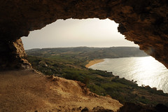 Looking down to Ramla Bay from the cave