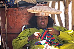 Herero Tribe Lady Wearing Traditional But Still Normal Every Day Dress Making Dolls