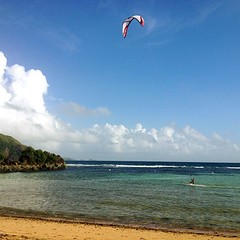 Kite surfing. It's luxurious these days to have a beach all to yourself.