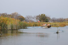 Safari group in boat on river near Camp Okavango in Botswana-01 9-9-10