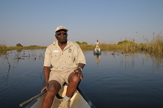 Guide in canoe in marsh near Camp Okavango in Botswana-01 9-8-10