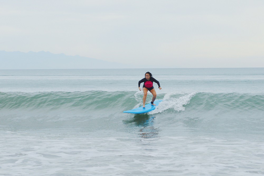 surfing at sabang beach