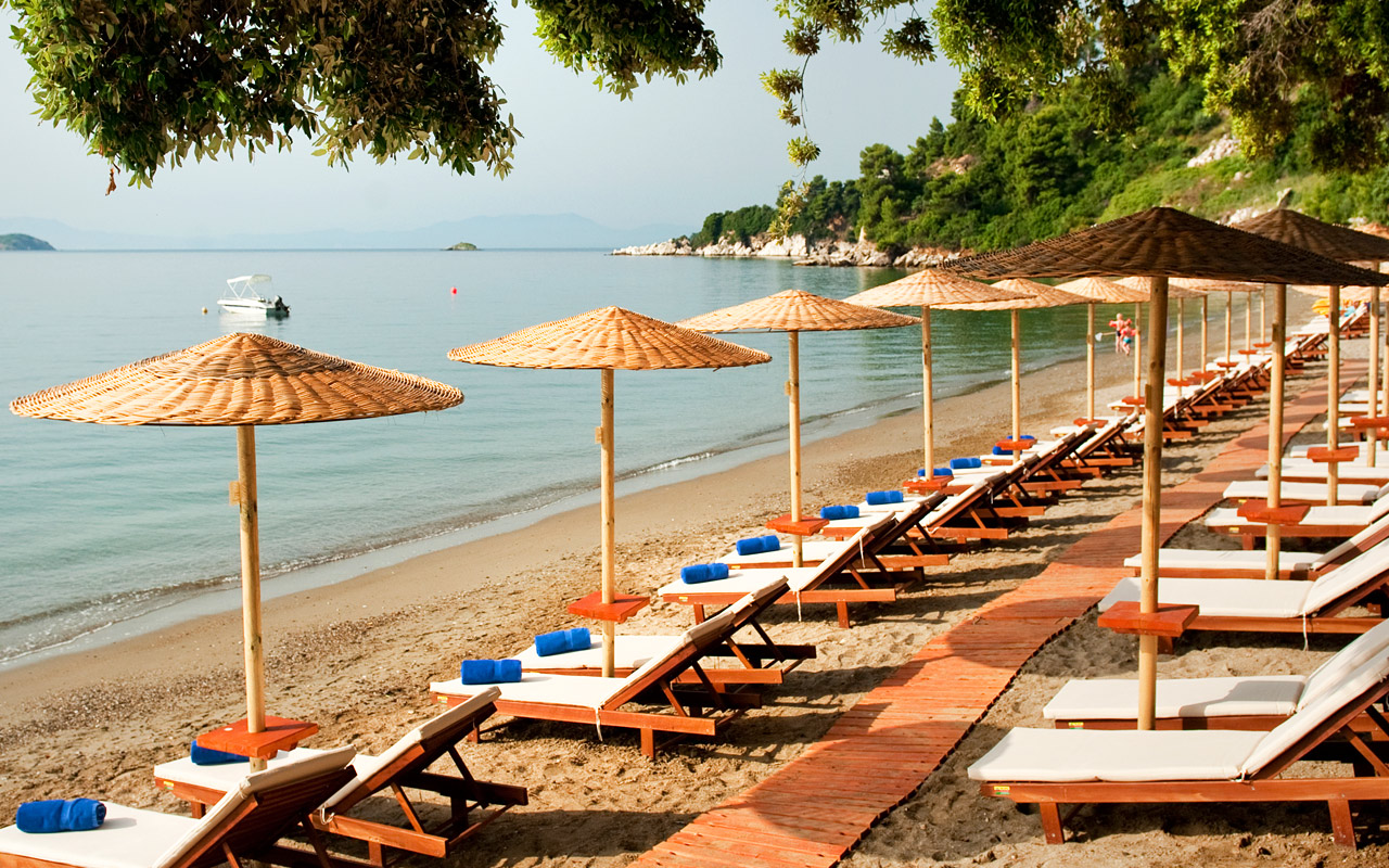Vasilias beach is equipped with Umbrellas and Sun-beds