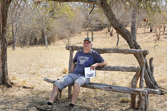 Lloyd takes a break on one of the many rustic benches at Campismo Aguia Pesqueira