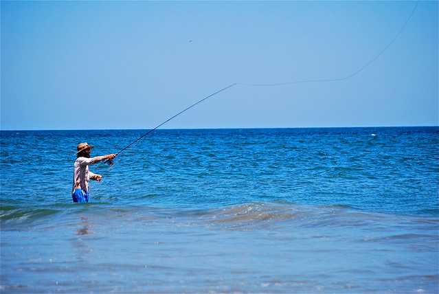 Ocean fishing in the blue waters of the Atlantic from False Cape State Park, Virginia
