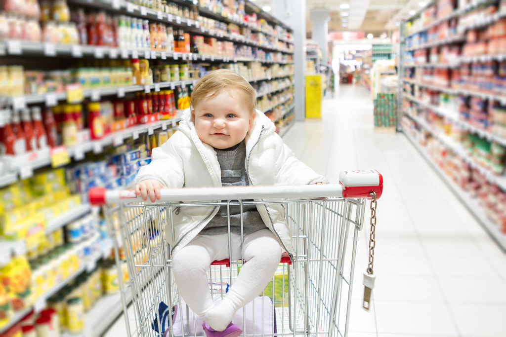 Baby girl in a shopping trolley  Baby girl sitting on a sho…  Flickr