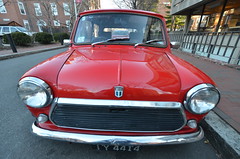 Old red Mini Cooper on Appian Way in Harvard Square