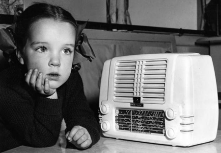 Little Girl Listens to White Radio