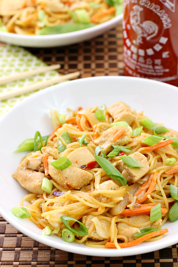 One Pan Chicken & Orange Chile Noodles in two white bowls.