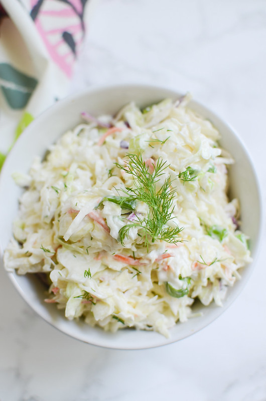 Creamy Dill Cole Slaw - the best homemade cole slaw recipe! Serve as a side dish or on top of your favorite BBQ sandwich!