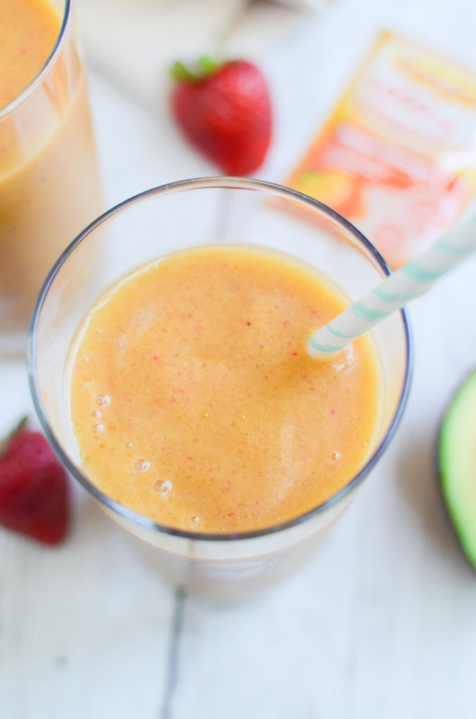 Strawberry Orange Smoothie - immune boosting and hydrating! Coconut water, strawberries, orange juice, and avocado make the most delicious smoothie!