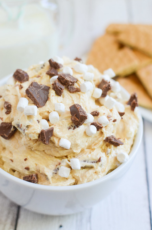 Peanut Butter S'mores Dip - the most delicious dessert dip! Peanut butter with chocolate and marshmallows! Serve with graham crackers for the ultimate s'mores experience!