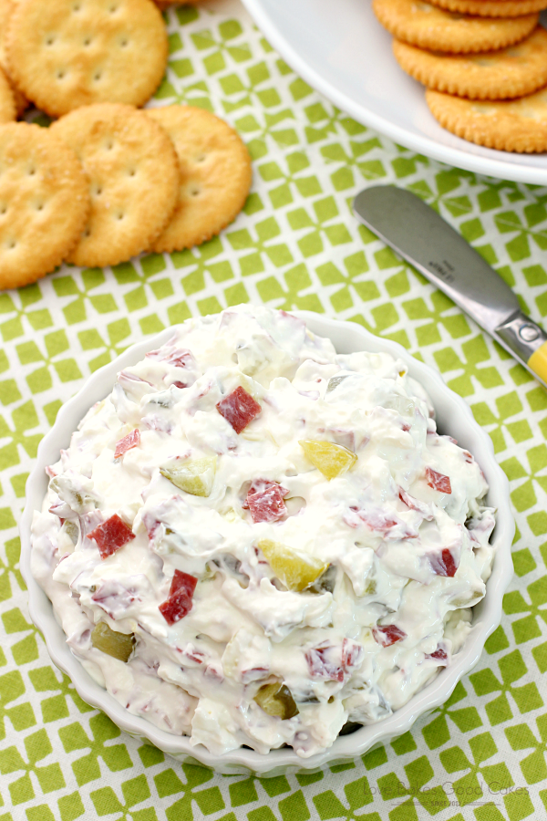 Dill Pickle Wrap Dip in a white bowl with Ritz crackers.