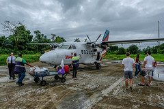 Unloading the airplane at Nuqui airport, Choco
