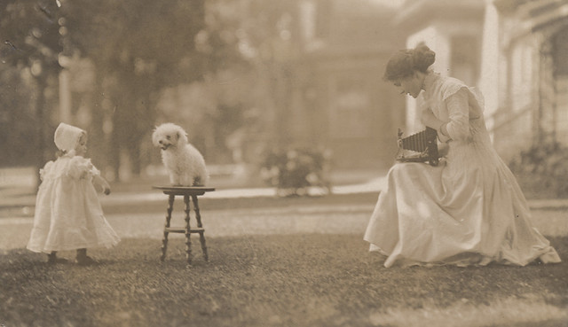 Florence Sallows photographing daughter and dog, date unknown