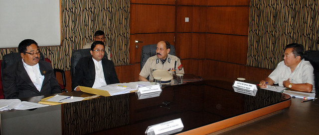 Assam DGP Khagen Sarma (second from right) appears before the one man inquiry commission in Guwahati.