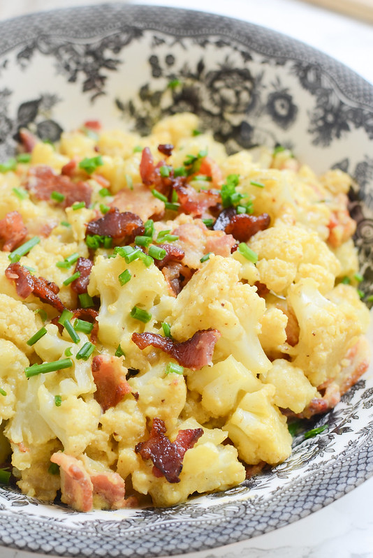 Loaded Cauliflower Mac and Cheese - cauliflower tossed in a delicious paleo cheese sauce and topped with bacon. Get your mac and cheese fix without the guilt! 