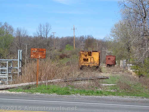 Old train cars along an undeveloped section of track on the Auburn Trail, New York