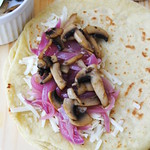 Quesadillas with caramelized onion, mushrooms and avocado