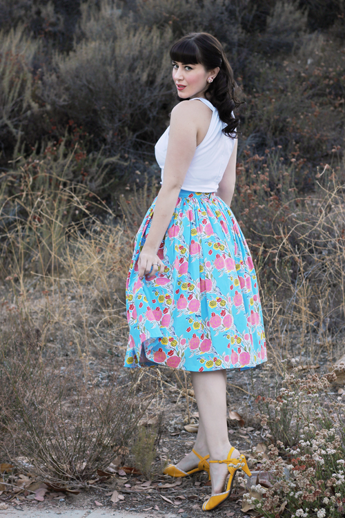 Pinup Girl Clothing Pinup Couture Jenny Skirt in Mary Blair Lips and Roses Print in Blue Harley Top in White