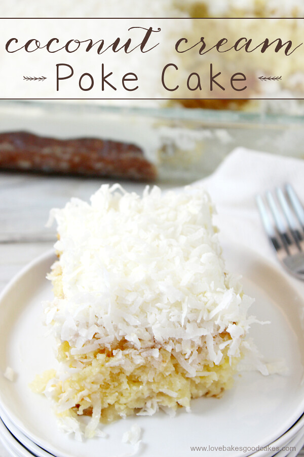Coconut Cream Poke Cake on white plate with a fork.