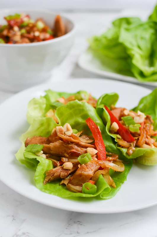 Mu Shu Pork Lettuce Wraps - skip takeout and make this healthy homemade version! Pork and veggies in a delicious slightly sweet, slightly spicy sauce! 